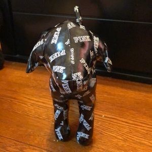 Large, black, PINK dog